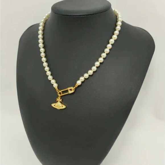 Vivienne Westwood Pearl Necklace with Gold Brooch Pendant